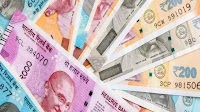 Rupee hits record low of 87.35 vs USD on rate cut expectations
