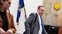 Who is the veteran prosecutor taking on a Grand Rapids ex-cop’s murder trial?