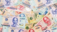 Investing in Vietnamese currency, dong, no sure bet, expert says