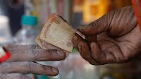 Indian rupee poised for steeper slide as trade war, growth fears mount: Reuters poll