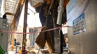 Roof collapse, water destroys building housing South Coast Repertory costumes, scenes