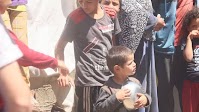 UN aid teams plead for access amid reports Gazans shot collecting food
