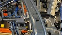 Vision-guided robotic system improves welding of car side panels