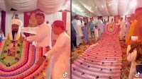 Pakistani man wears 35-foot cash garland worth 1 lakh PKR on wedding day. Watch | Trending - Hindustan Times