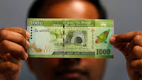 Sri Lankan rupee hits fresh low against dollar