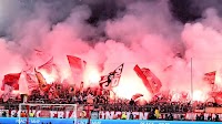 Met cop sacked for throwing flare and wearing balaclava during Arsenal match
