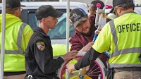 Coweta County Prison staff assemble bikes for Christmas With a Cop