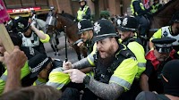 U.K. migrant protests spark angry confrontations as government scrambles to respond