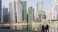Singapore dollar has shot at climbing to parity, Jefferies says