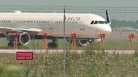 As DTW begins using controversial landing system again, Dingell calls to suspend use of it