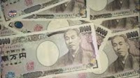 Japanese Yen Slides As Bank Of Japan Resists Rate Hike