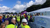 Tradespeople turn out in force for big reveal at children's charity