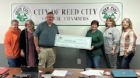 Crossroads Recreation Connection hands Reed City funds for pocket park