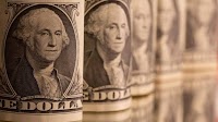 Dollar creeps up against dong