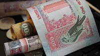 Why are Indians in the UAE rushing to send their money home now?