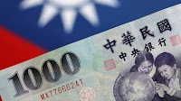 Bulls pile up on Taiwan dollar most since late 2020, trim long position on rupee