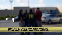Black St Louis police officer shot by white colleague 'fearing for his safety'