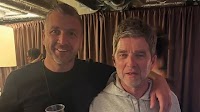 Brit gangster pictured rubbing shoulders with Noel Gallagher at Oasis gig