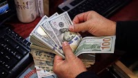 Dollar slides against dong