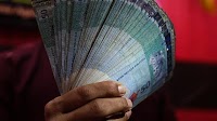 Ringgit’s decline due to 1MDB shock and lack of competitiveness in Malaysia post-Asian financial crisis, says World Bank economist