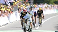 Pogacar back in yellow jersey after winning stage seven of Tour de France