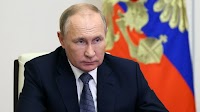 The International Criminal Court issues an arrest warrant for Putin