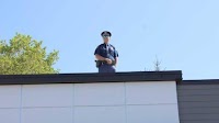 Cop on the Roof