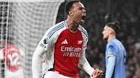 Arsenal rely on defence and set-pieces again to revive title bid