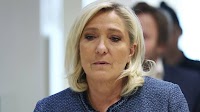 France's Le Pen sentenced to jail, banned from public office