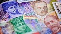Georgian Lari rises vs most currencies