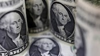 Dollar falls against dong