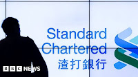 Standard Chartered shares sink on shock quarterly loss
