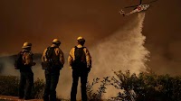 Winds threaten the containment of wildfires. And, DHS chief reflects on his career