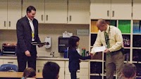 AFN awards 2 coloring contest winners with money for their schools
