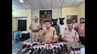 Two held with 1,440 bottles of cough syrup