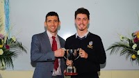St Ailbe's principal presents Rory Sampson with the cup for Student of the Year 2022