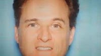 Doctor attempted to kill wife by trying to push her off Hawaii trail and bashing her with rock, police say