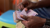 Ethiopia's birr drops 30% as central bank floats currency