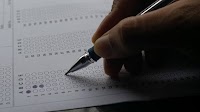 KPSC exam candidates protest against delay of OMR sheets distribution