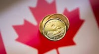 Canadian dollar hits lowest level since 2003