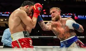 Paul easily tops Chavez, calls for 'tougher fighters'