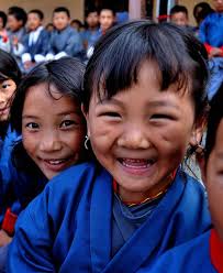 Happy Faces From Bhutan. Image by Flickr user laihiu and used under a creative commons license. Jigme Singye Wangchuck, the 4th King of Bhutan first coined ... - happy-faces-from-Bhutan-640x480