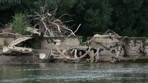 Drought reveals 100-year-old boat in Serbia and ancient Roman bridge in Italy