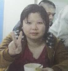 Lee Iok-lin, aged 31, about 1.55 metres tall, 68 kilograms in weight and of fat build. She has a round face with yellow complexion and short straight black ... - P201403260800_photo_1066817