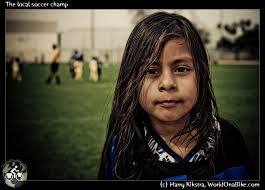 This little boy, Kevin Flores, is an awesome player on the Ross Snyder PeeWees team In LA. He took posing very serious. He was probably already used to it ... - 20090221img-2382the-local-soccer-champ