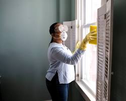 Image of House sitter keeping the house clean and tidy