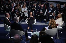 Ocasio-Cortez Offers a Working-Class Vision in Munich, With Some Stumbles