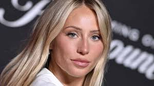 Alix Earle shines in a stunning Jimmy Choo ensemble on the cover of Rollacoaster