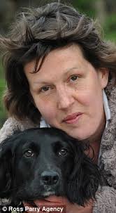 Lucky escape: Louise Horsfall is pictured with her 14-month-old Spaniel cross, Lola, who was thought to be slightly poisoned - article-1392352-0C5501AF00000578-322_233x423