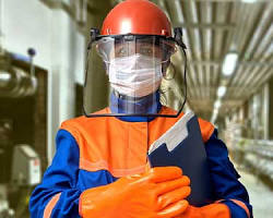 تصویر worker wearing an industrial workwear in a factory